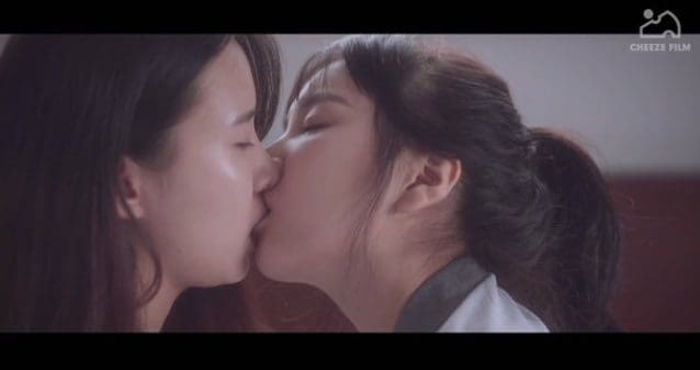 Girl Persuades Friend To Share A Luxurious Kiss